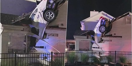 Автомобиль взлетел и врезался в крышу дома (видео)
